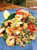 Grilled prawns with egg wild fried rice and samphire