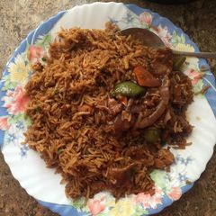 A picture of Chicken rice and wet fried beef.