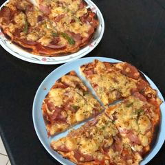 A picture of Homemade Salami & Cheese Pizza.