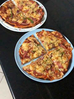 A picture of Homemade Salami & Cheese Pizza.