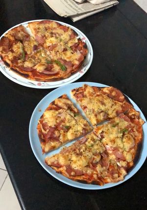 A picture of Homemade Salami & Cheese Pizza.