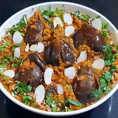 A picture of Stuffed Masala Brinjals.