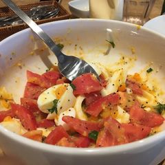 A picture of Tomato and egg salad.