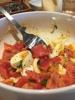 A picture of Tomato and egg salad.