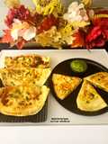 Bolani - Afghani Breakfast - Flatbread Stuffed With Potatoes, Spring Onions, Cilantro And Spices