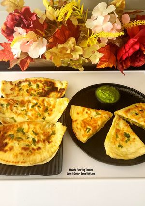A picture of Bolani - Afghani Breakfast - Flatbread Stuffed With Potatoes, Spring Onions, Cilantro And Spices.