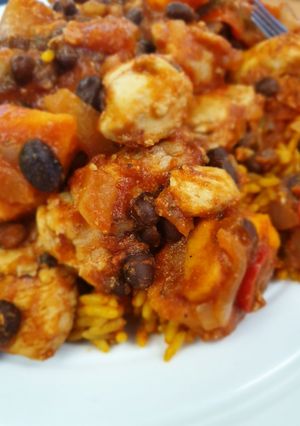 A picture of Mexican chicken, sweet potato and black bean.