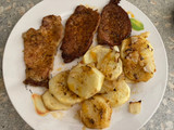 Cinta de lomo de cerdo en adobo al horno con papas panaderas