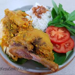 A picture of Ayam betutu (spicy grilled chicken).