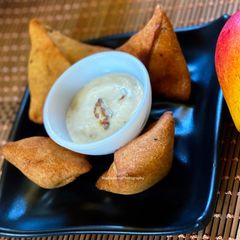 Green Mango Mini Samose A picture of Green Mango Mini Samose.