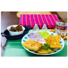 A picture of Egg Chicken Mughlai Paratha.