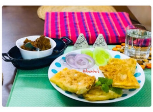 A picture of Egg Chicken Mughlai Paratha.