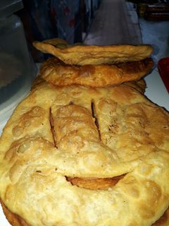 Una foto de Torta Frita Argentina con chicharrón