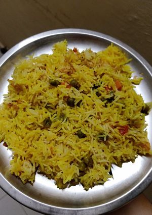 A picture of Peas Pulao in pressure cooker.