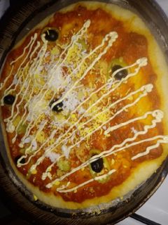 صورة لوصفة بيتزا بالسميد 🍕