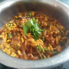 A picture of Sev tamater ki sabzi.