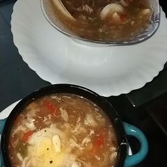 A picture of Chicken and vegetables soup.