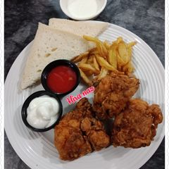 A picture of Chicken Broast With French Fries.