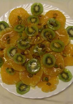Foto principal de Kiwi y naranja en salsa caramelizada