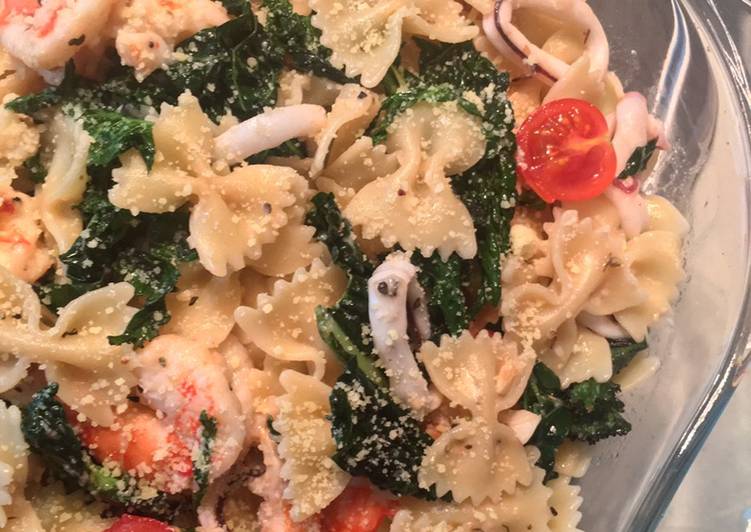 Mediterranian farfalle with seafood and kale