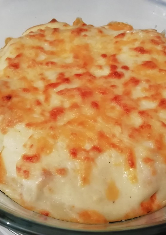 Una foto de Huevos rellenos de carne gratinados