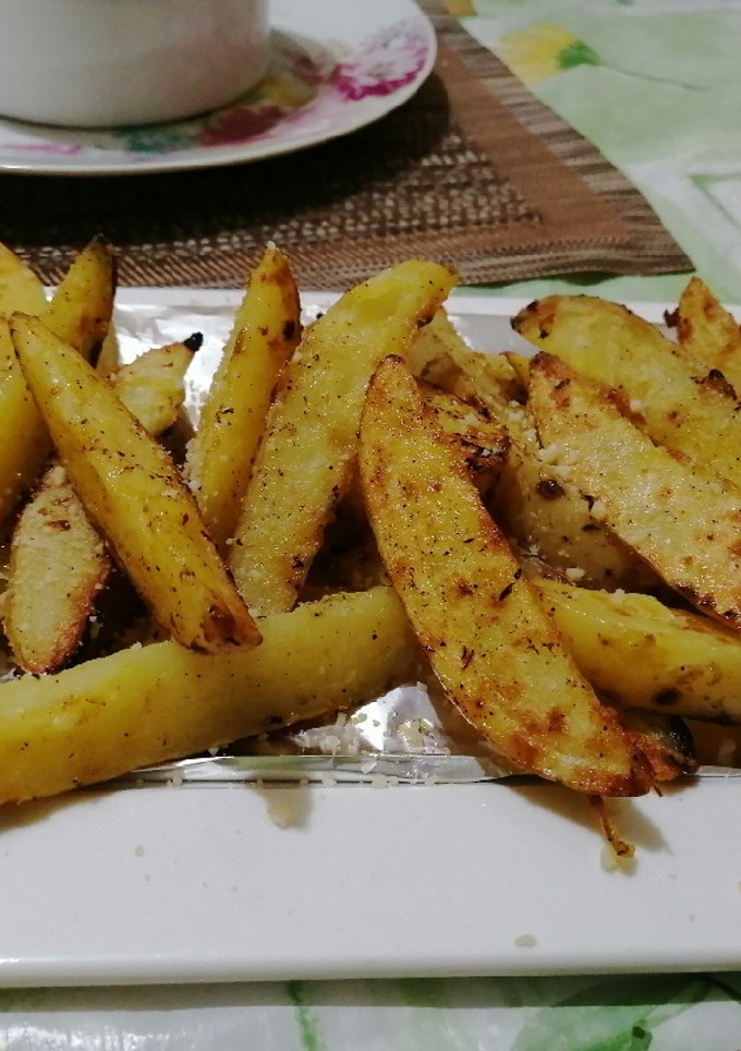 Una foto de Papas crocantes saludables en sartén