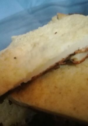 Una foto de Fainá de queso y cebolla