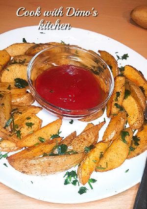صورة لوصفة بطاطس ودجز فى الفرن 👌👌😋😋
