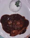 Filete de pescado en salsa roja tipo (Mole)