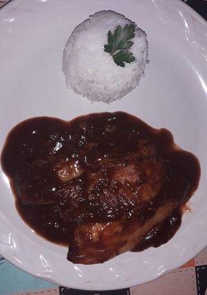 Una foto de Filete de pescado en salsa roja tipo (Mole)