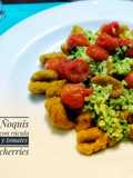 Ñoquis con pesto de rúcula y tomates cherries