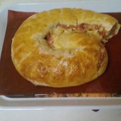 A picture of Garlic Roll with Chakalaka/Mince and Parmesan.