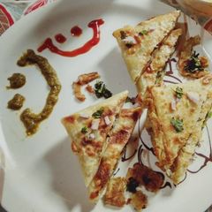A picture of Mughlai Egg Paratha.