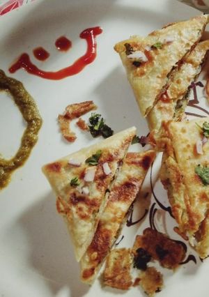 A picture of Mughlai Egg Paratha.