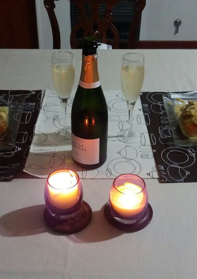 Una foto de Salmón Rosado con salsa de berberechos y puré de coliflor
