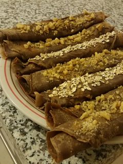 Una foto de Panqueques de chocolate con manjar