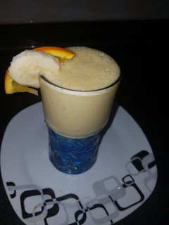 A picture of Banana orange smoothie.