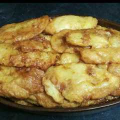 Una foto de Torrijas de leche con almíbar de naranja 🍊😋