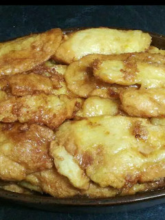 Una foto de Torrijas de leche con almíbar de naranja 🍊😋