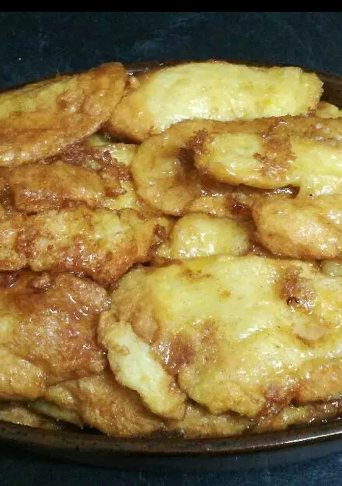 Una foto de Torrijas de leche con almíbar de naranja 🍊😋
