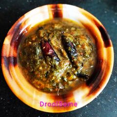 A picture of Amaranthus tamarind curry.