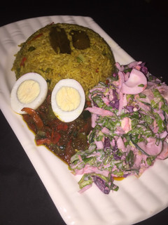 A picture of Fried rice with beetroot salad.