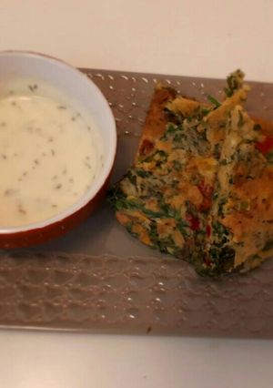 Une photo de Galette de fanes de carottes, poivrons et emmental