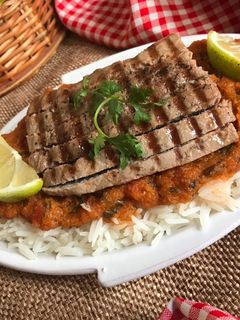 صورة لوصفة سمك الطونة بصلصة الطماطم و الأرز👍