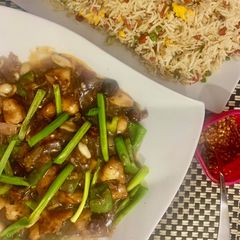 A picture of Restaurant style Kung Pao with roasted peanuts.