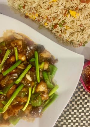 A picture of Restaurant style Kung Pao with roasted peanuts.