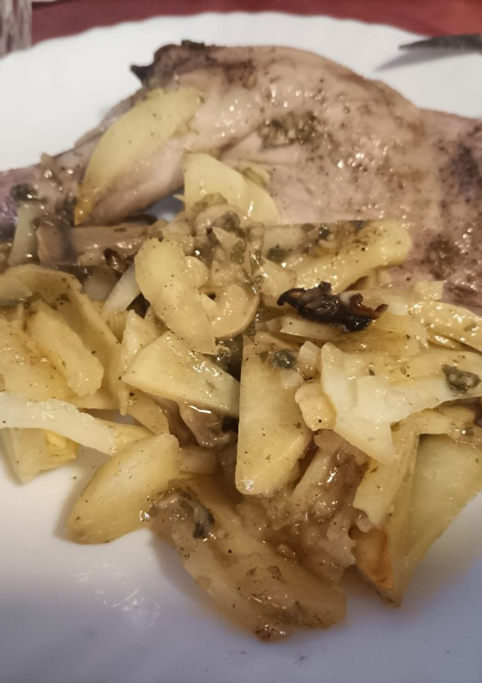 Una foto de Conejo con patatas y champiñones al vermut