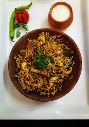 A picture of Methi Tomato Rice.