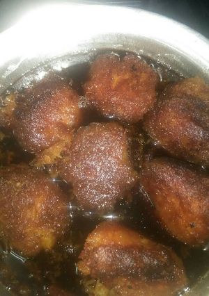 Una foto de Buñuelos de yuca en miel