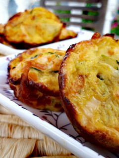 Una foto de Mini quichés de calabacín y zanahoria